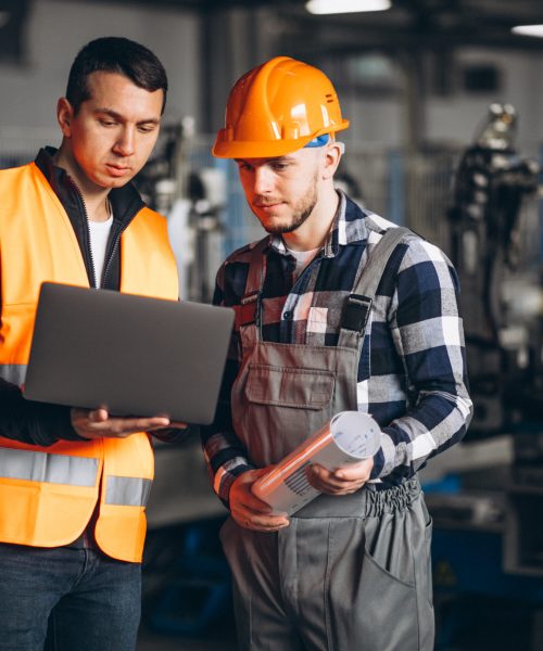 Two colleagues at a factory